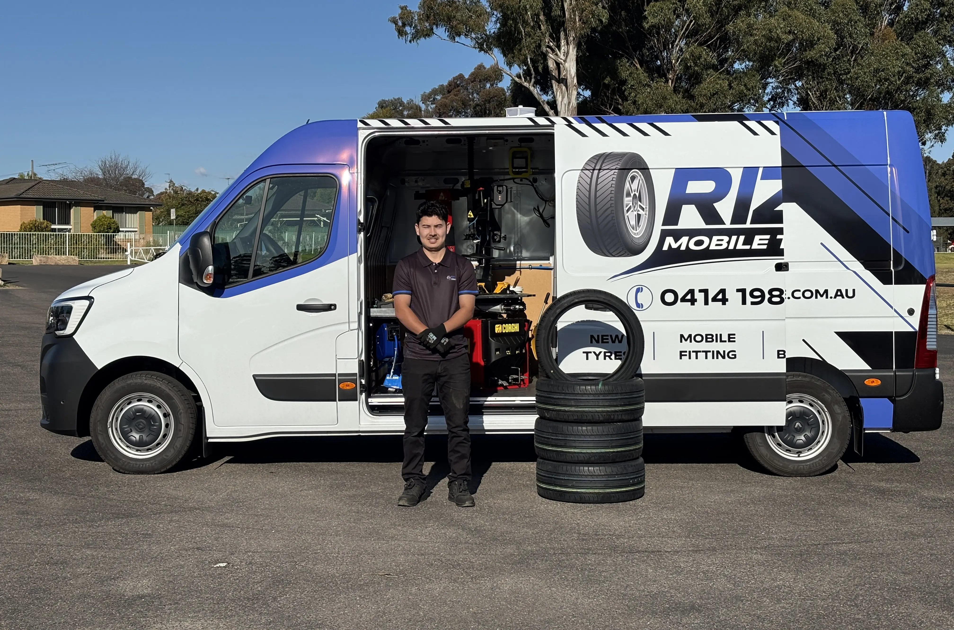 A wheel being balanced on a tyre machine